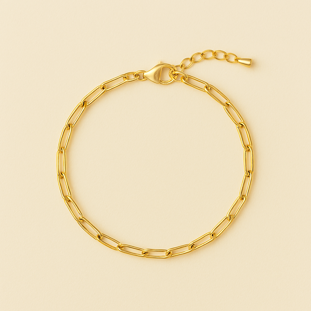 paperclip gold chain bracelet – 14k gold plated stainless steel bracelet on oat beige background