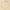close-up of single diamond necklace with 14k gold chain – floating pendant on soft oat background
