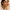white woman modeling gold and pearl drop earrings – dainty and chic | Glowvy
