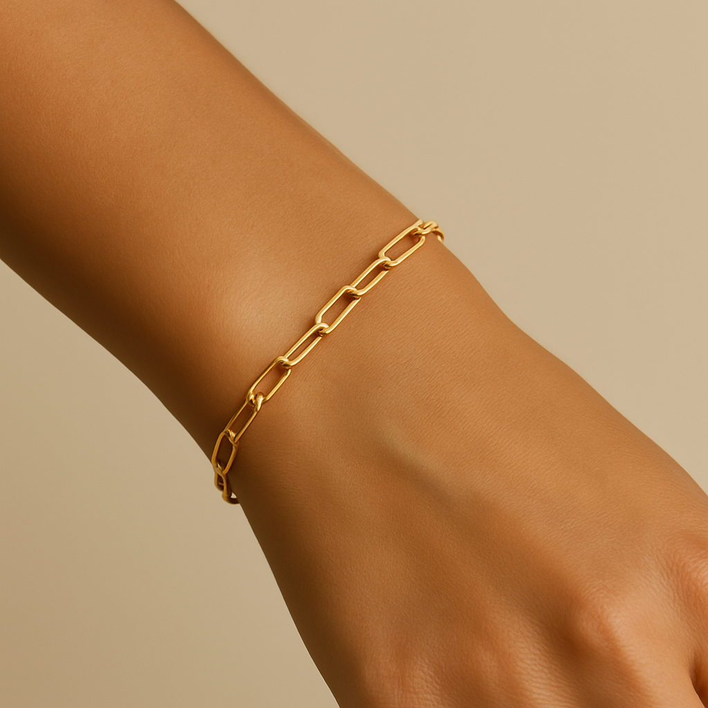 white woman modeling gold chain bracelet – simple paperclip design for everyday elegance
